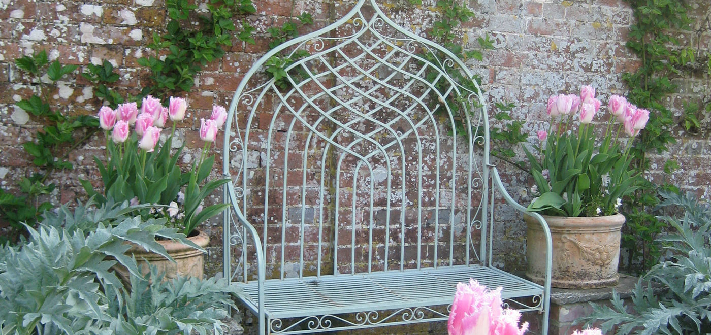 PASHLEY MANOR GARDENS Pink Tulips And Bench By Kate Wilson